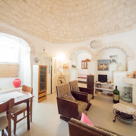 Trulli Girasoli E Viole Cocolicchio Quarto foto